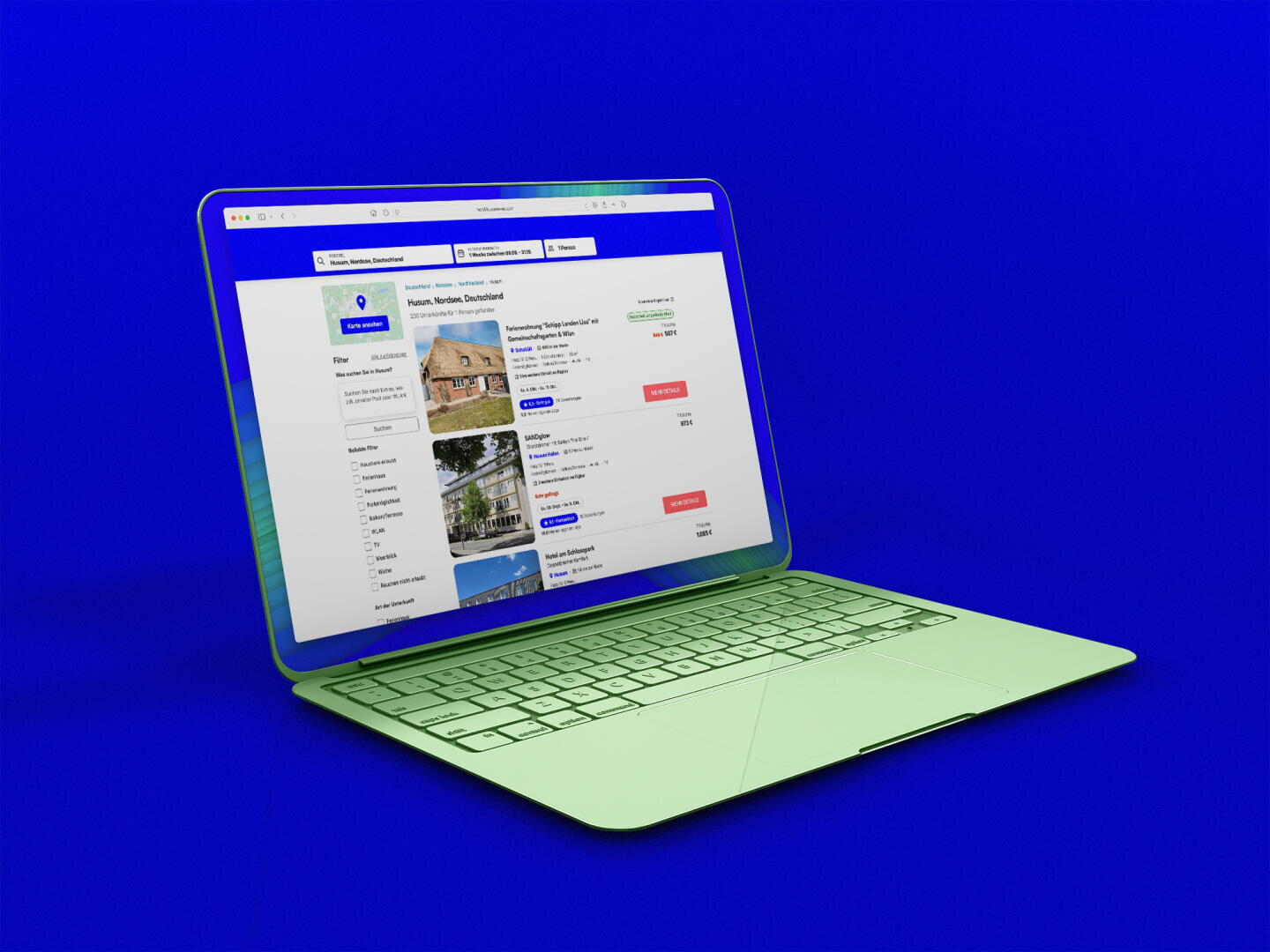 A laptop with a green keyboard shows a real estate website with real estate listings on its screen against a light blue background.