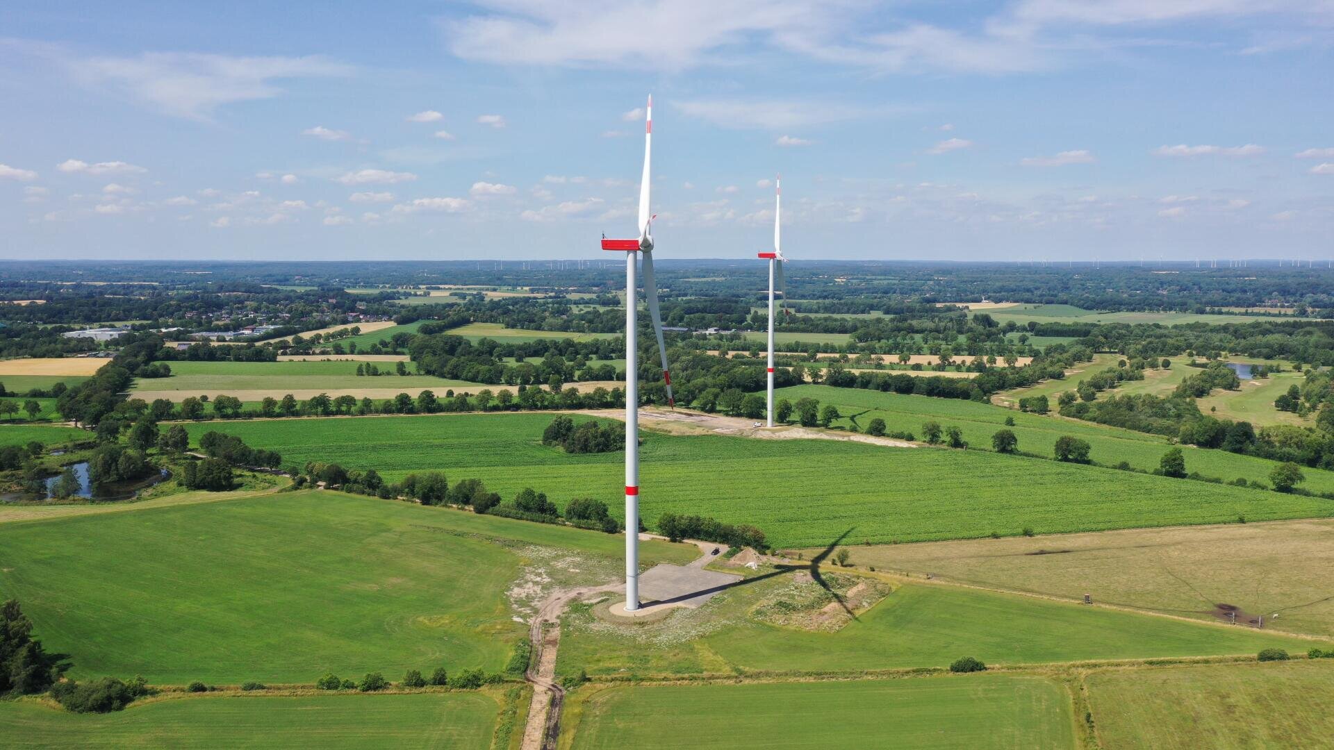 A windmill in a field.