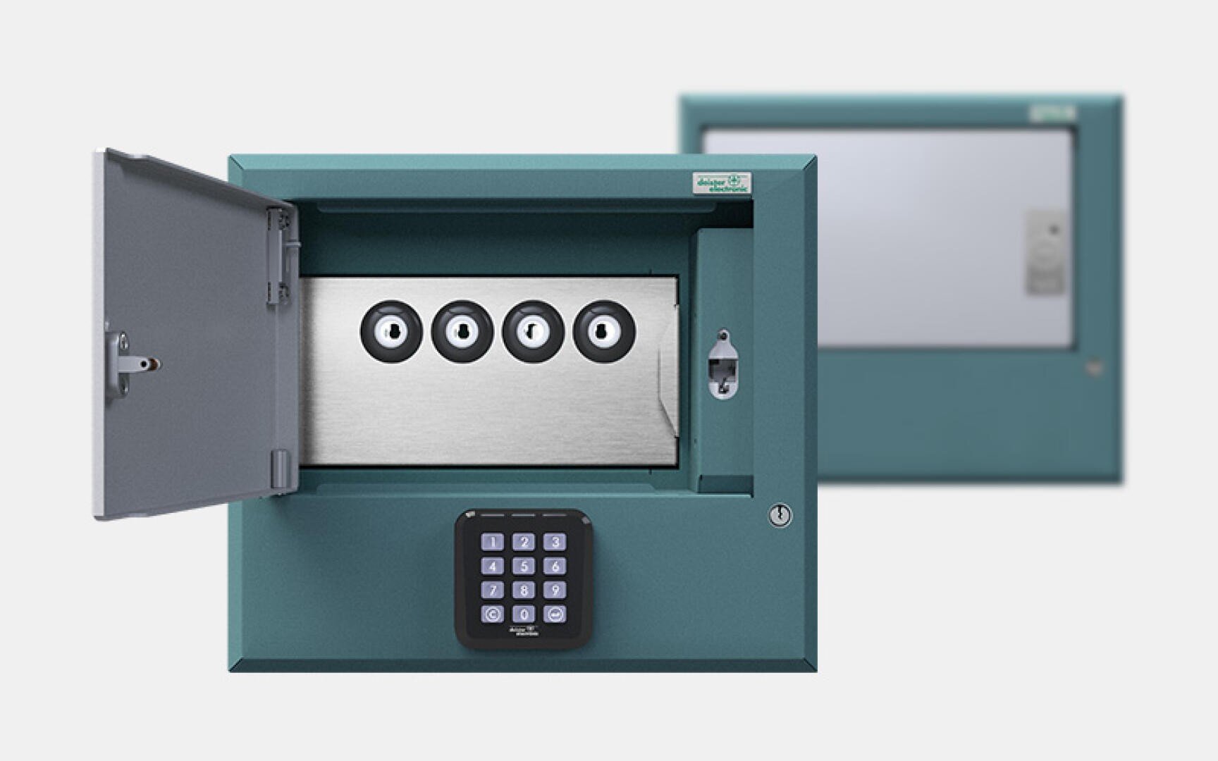 A teal-colored electronic safe with a keypad is open, revealing four circular compartments inside. Another closed safe can be seen in the blurred background. The safes stand in front of a plain white surface.