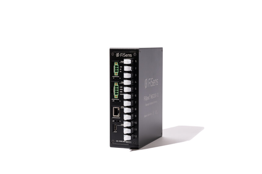 A black FSens industrial network switch with multiple fiber and Ethernet ports is shown standing upright on a white background, displaying its front panel with labeled connections.